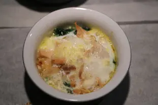 Baked eggs with chicken and spinach