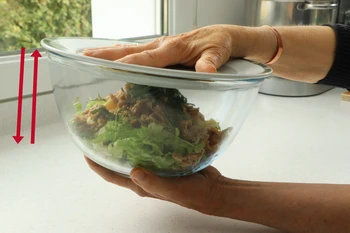 Mixing in a salad bowl