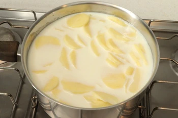 sliced potatoes in milk