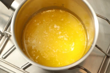 Melted butter in the pan