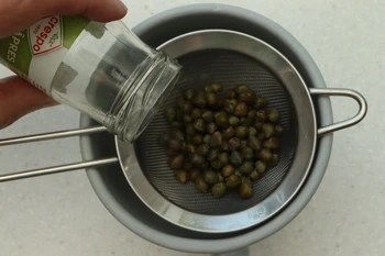 emptying capers jar
