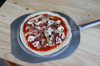 pizza ready to go in the oven