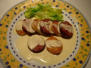 Sausage with duchess potatoes and a Mont d'Or fondue 