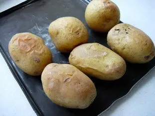 Baked potoatoes with herb butter or cream 