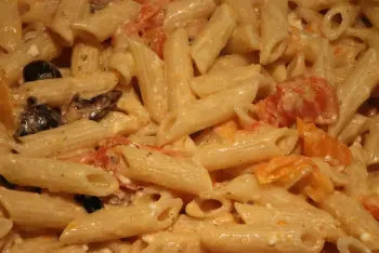 Pasta with cherry tomatoes, olives and feta cheese