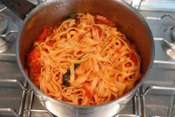 Tagliatelle with rillons and tomatoes
