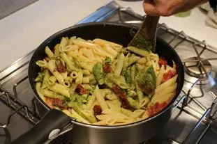 Pasta with pesto and preserved tomatoes