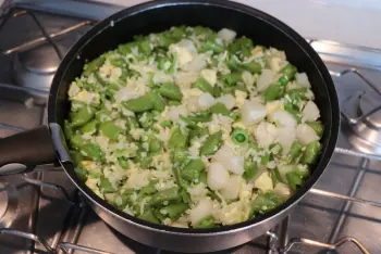 Fried rice with turnips and new peas