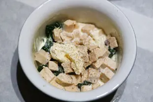 Baked eggs with chicken and spinach