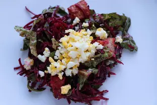 Green and red salad with sardines and eggs mimosa