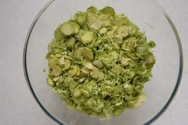 Brussels sprouts salad with smoked trout and Comté cheese