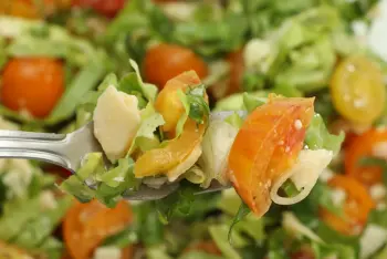 Cherry tomato salad, mixed greens, and Parmesan shavings