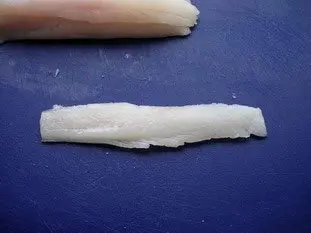 Rolls of fish in smoked ham
