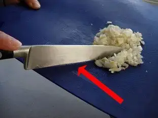 You should not push with the sharp edge of a knife