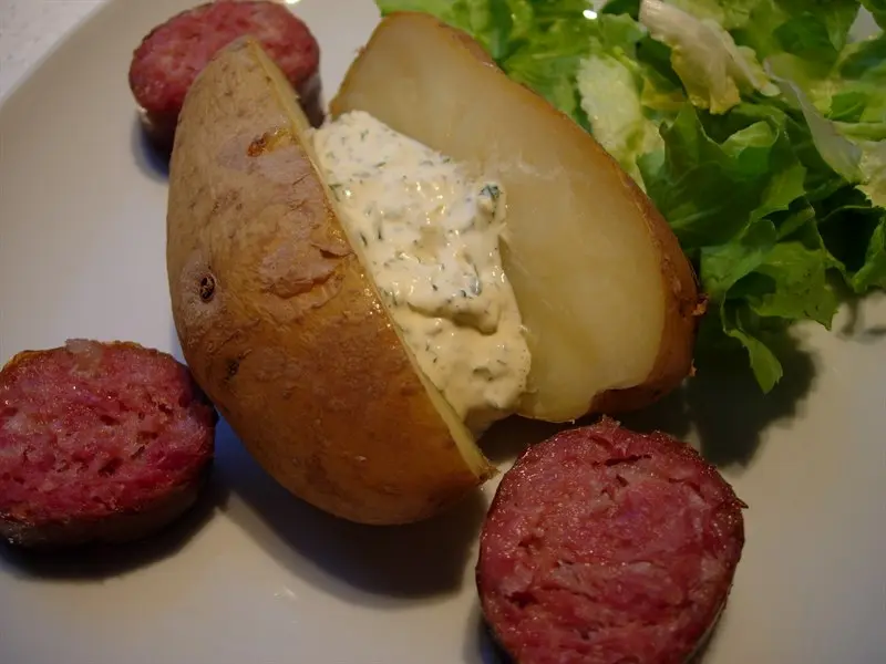 Baked potoatoes with herb butter or cream