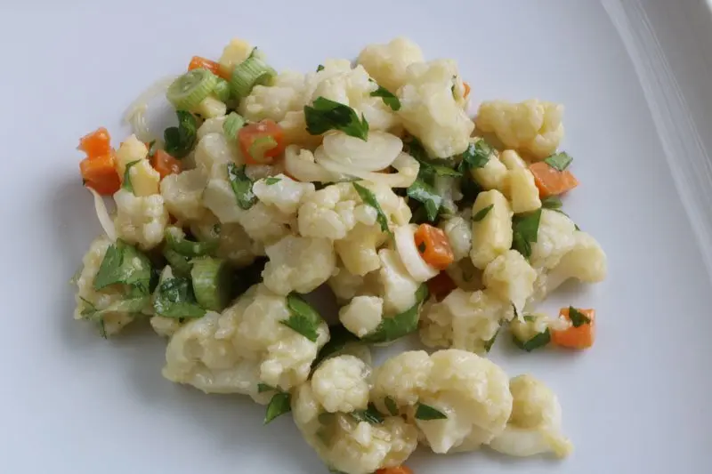 Warm cauliflower salad with two cheeses