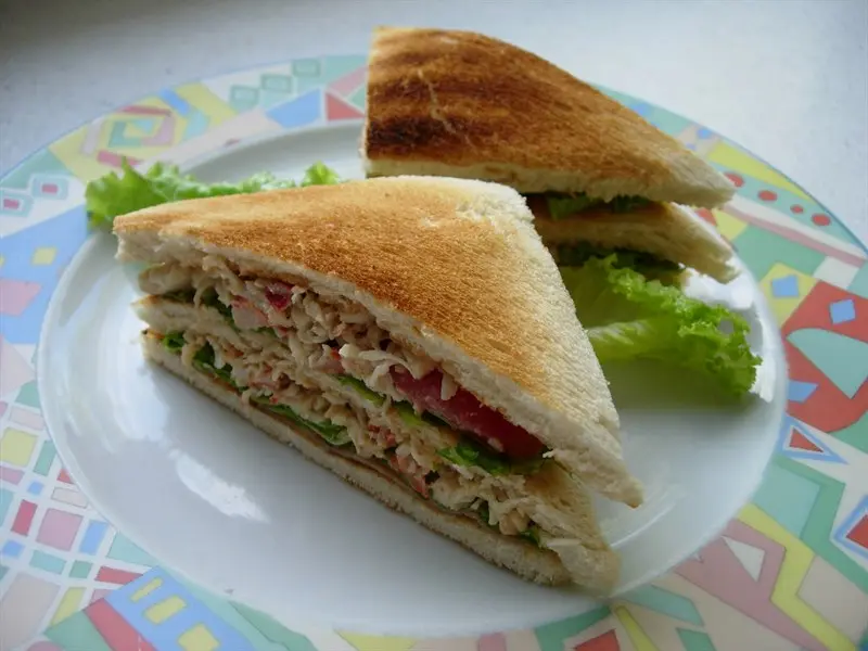Crab and smoked salmon club sandwiches