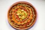 Thin cherry tomato and pesto tart