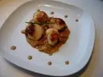 Pan-fried scallops and chanterelles with Noilly Prat sauce