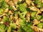 Sliced chicken with mushrooms and broccoli