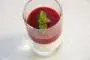Panna cotta made with almond milk and stewed plums.