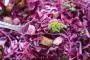 Shredded red cabbage, fresh herbs, diced Parmesan and fried croutons in a good vinaigrette.