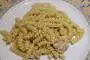 Pasta cooked separately, then mixed with tuna and cream.