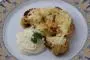 Thick slices of cauliflower roasted with spices, then finished like a gratin with a creamy cauliflower topping.
