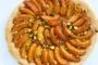 Caramelized puff pastry base, apricots, almonds and pistachios.