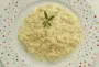 A risotto made with small cubes of celeriac and mascarpone at the end of cooking.