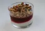 A layer of mascarpone whipped cream, another of blackcurrant coulis and a final layer of granola.