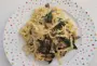 Tagliatelle with mushroom and spinach cream.