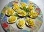 Hard boiled egg whites filled with herbes mayonnaise and egg yolks.