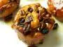 Caramelized puff pastry rolls filled with raisins, dried apricots and pecan nuts.