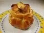 Pear filled with confectioner's custard, wrapped in a sweet pancake and puff pastry.