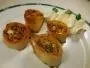 Brik or filo rolls filled with a mixture of smoked salmon, herbs, eggs and mustard.