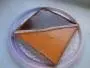Sweetcrust pastry with separate layers of chocolate ganache and orange curd.