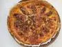 Tart with puff-pastry, ham, fried endives and light quiche-style filling.