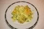 Thin layers of poached leeks and hard-boiled eggs with craem and cheese.