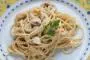 Creamy mushroom and shallot sauce with pasta cooked "al dente".