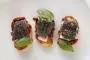 Canapés of red mullet with poppy seeds