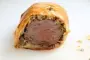 Beef filet in a pastry crust with mushrooms and foie gras.