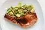 Pan-fried pork chops served with Brussels Sprouts, romanesco and the reduced cooking juices.