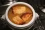 Slow-cooked onion soup, topped with cheese croutons.