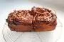 Flaky brioche with butter, chocolate, brown sugar and toasted pecan nuts.
