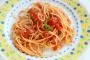 Pasta with bacon and fresh tomatoes simmered down into a sauce.