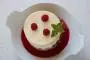 Two layers of cake soaked in kirsch, around raspberries in a vanilla mascarpone cream.