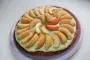 Caramelized puff-pastry feuilletage, light verbena custard and double rosette of peaches.