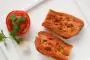 Toasted bread rubbed with tomato.