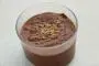 Gourmet chocolate mousse with toasted hazelnuts.